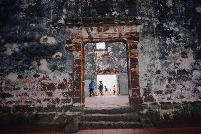 People at historical building