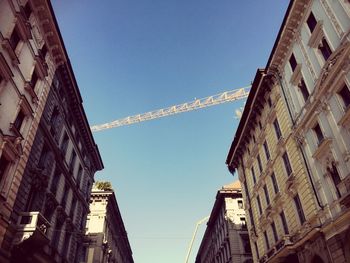 Low angle view of buildings against clear sky