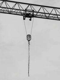 Low angle view of hanging against sky