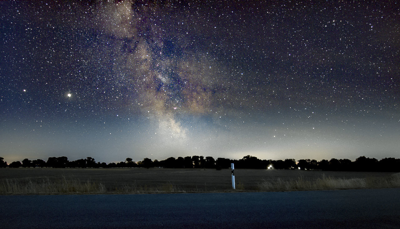 star, astronomy, space, sky, night, galaxy, scenics - nature, beauty in nature, science, milky way, nature, astronomical object, space and astronomy, environment, landscape, star field, tranquility, constellation, tranquil scene, land, outdoors, no people, long exposure, plant, idyllic, tree, dark, water, infinity