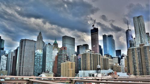 Modern buildings in city against sky