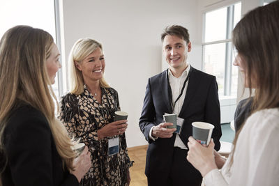 Business people talking during coffee break