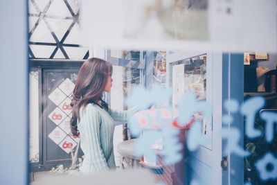 Woman looking at store