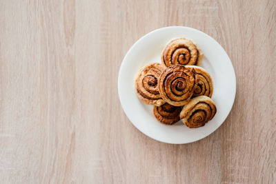 High angle view of cookies in plate on table