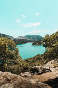 Scenic view of bay against sky