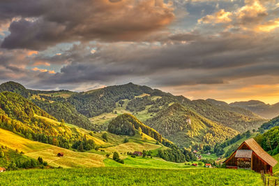 Scenic view of landscape against sky during sunset