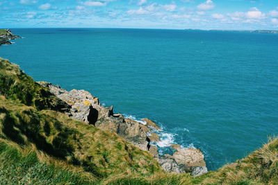 Scenic view of sea against blue sky