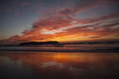 Scenic view of sea at sunset