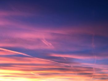 Low angle view of dramatic sky during sunset