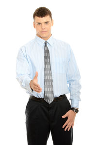 Mid adult man standing against white background