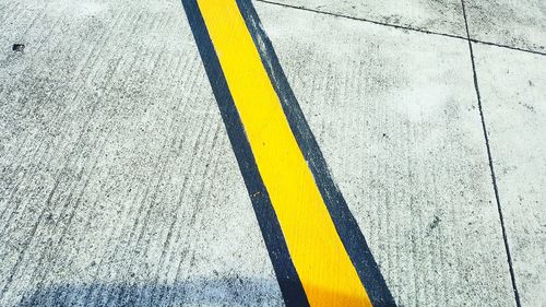 High angle view of road marking on street