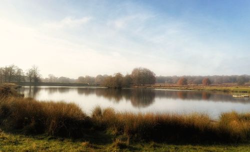 Scenic view of lake against sky