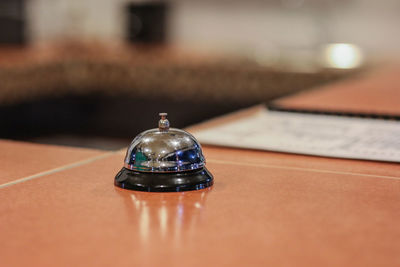 Close-up of electric lamp on table