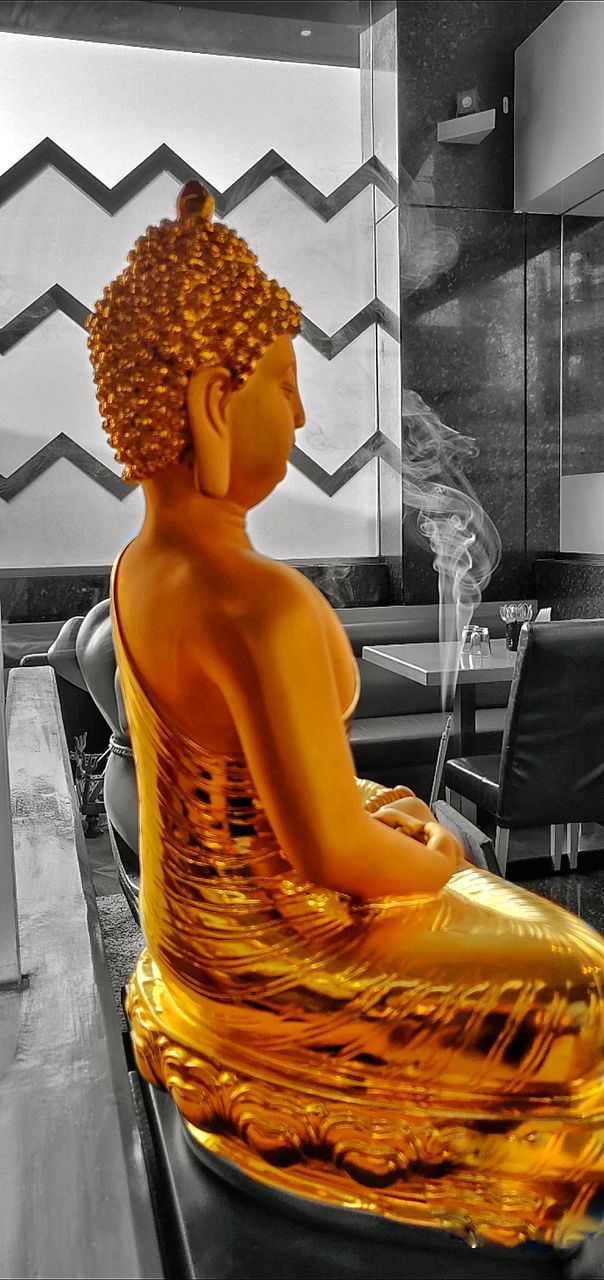 human representation, representation, sculpture, statue, art and craft, religion, yellow, male likeness, belief, no people, creativity, spirituality, gold colored, indoors, orange color, idol, built structure, architecture