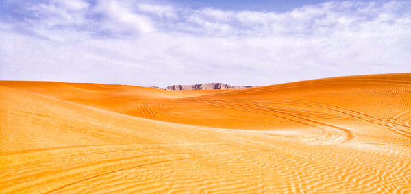 Scenic view of desert against sky