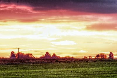 Scenic view of dramatic sky during sunset