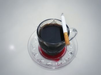 High angle view of coffee cup on table