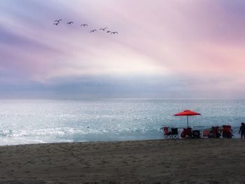 Scenic view of beach against sky