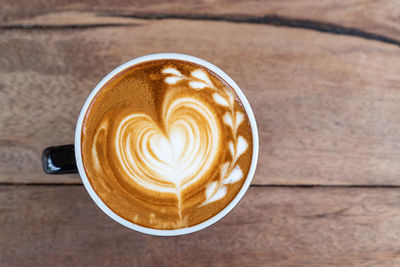 Directly above shot of cappuccino on table