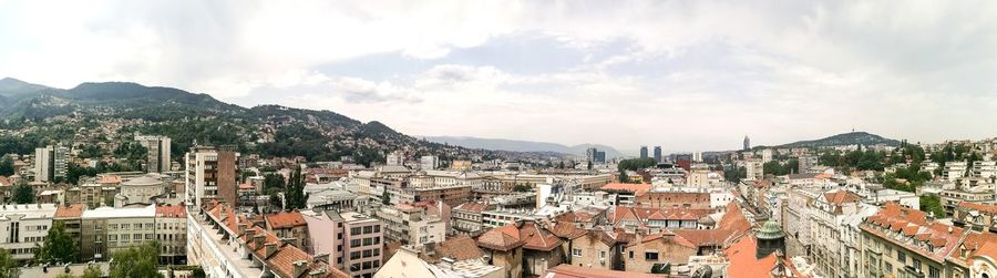 Panoramic view of cityscape against sky