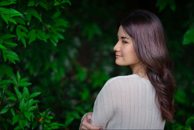 Young woman looking away