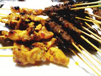 Close-up of meat on barbecue grill