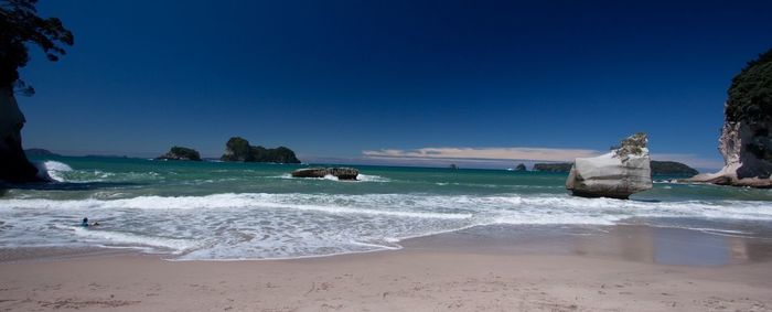 Scenic view of sea against clear blue sky