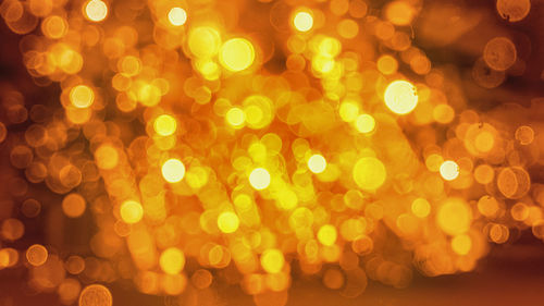 Defocused image of illuminated lights at night