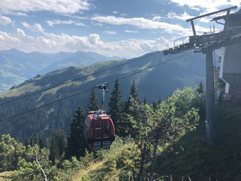 High angle view of overhead cable car against mountain range