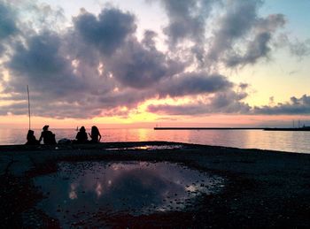 Scenic view of sea at sunset