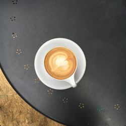 High angle view of cappuccino on table