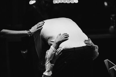 Rear view of couple kissing