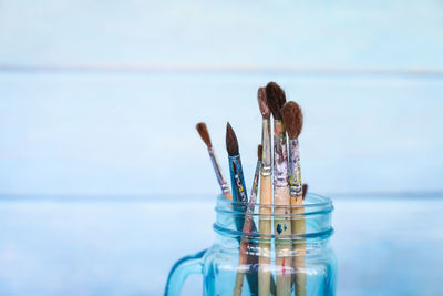 Close-up of glass jar on table