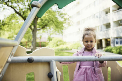 Girl having fun playing in playground