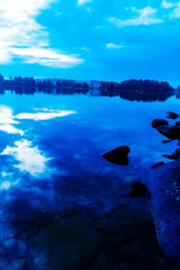 Scenic view of sea against cloudy sky