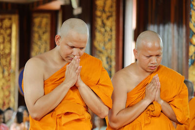 Monks having ordination ceremony at temple