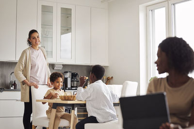 Family working and doing chores at home