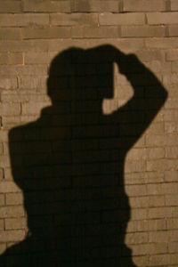 Shadow of woman on wall
