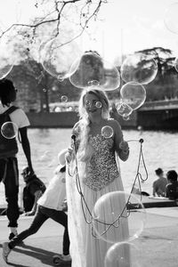 High angle view of woman with bubbles in water