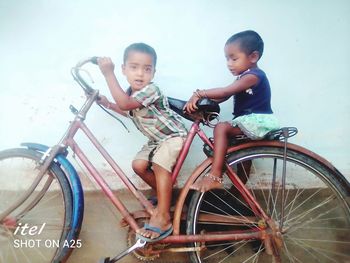 Boy riding bicycle