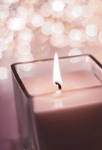 Close-up of illuminated candle