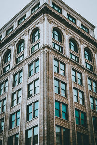 Low angle view of modern building against clear sky