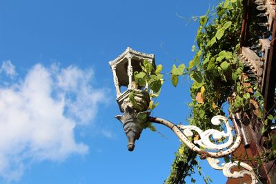 Low angle view of building against blue sky