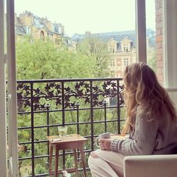 People looking through window