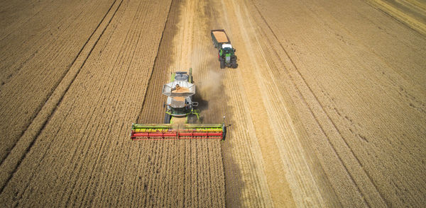 High angle view of agricultural machinery on field