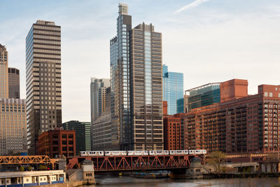 Train over the chicago river on lake street, chicago, illinois, usa