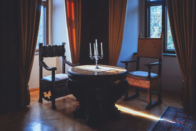 Empty chairs and table at home