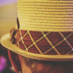 Close-up of hat wearing mask