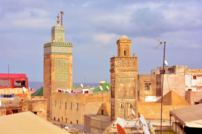 Historic building against cloudy sky