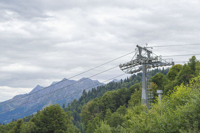 Lifts of the mountain cable car on the background of mountains